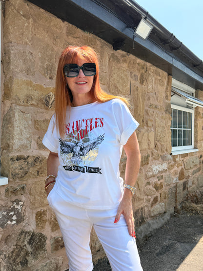 Liberty: White “Los Angeles” eagle graphic T shirt. One size: 10-16