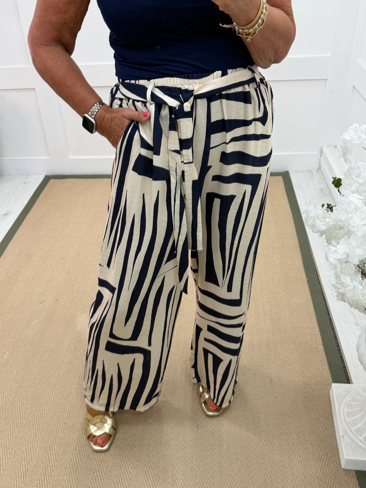 Tanaya: Printed wide leg trousers with belt. One size: 10-16. 4 colours