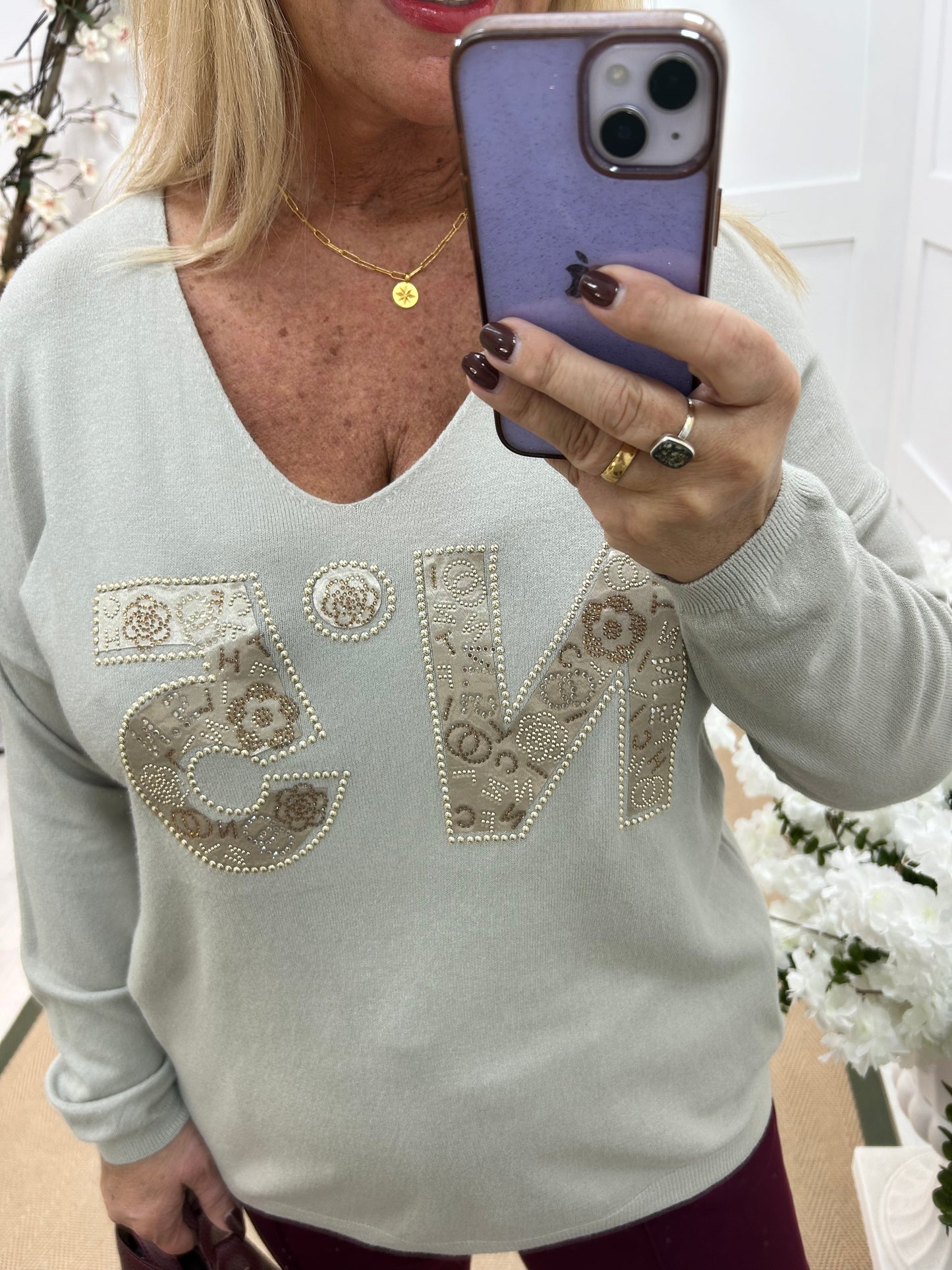 Cass: Stone V neck diamanté No5 knit top. One size: 14-20