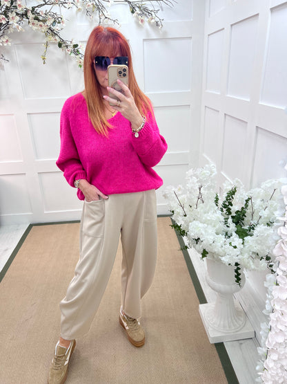 Alex: Hot pink V neck knitted top. One size 14-20