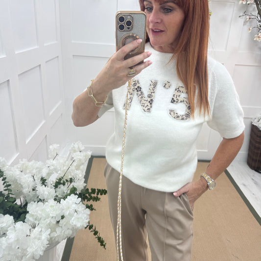 Chantelle: White No 5 logo knit top. One size: 10-16