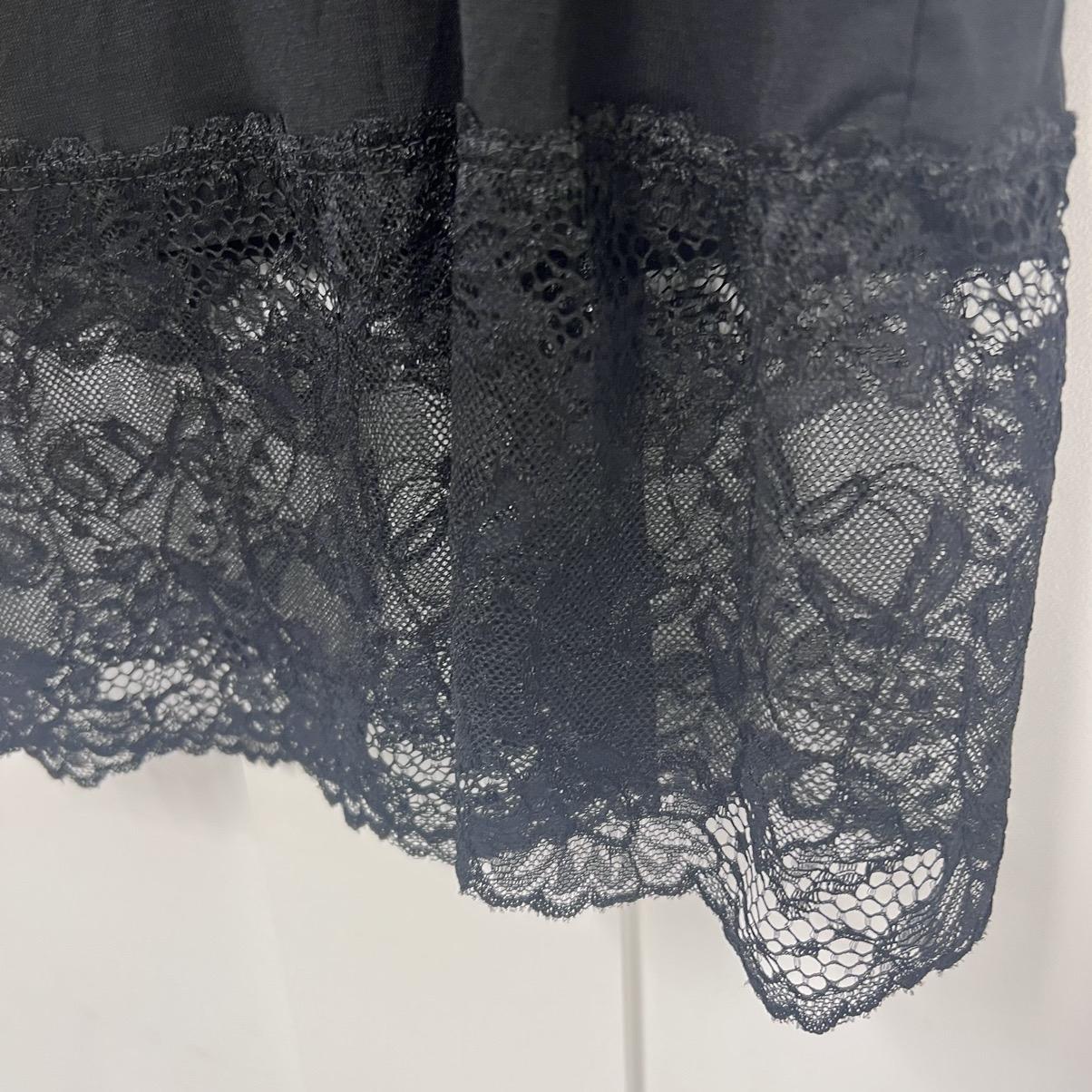 Violeta: Black long plus size layering vest. One size: 18-24/26