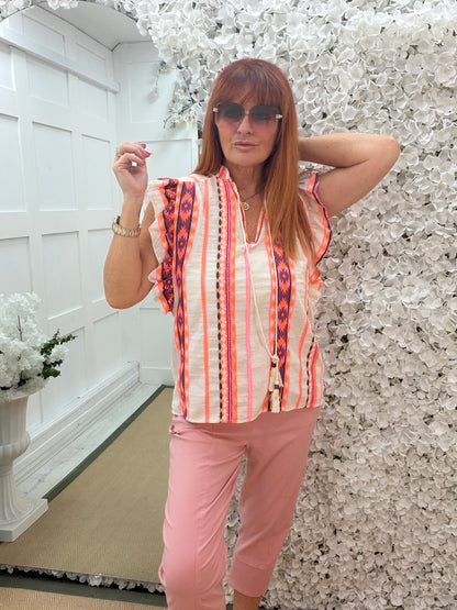 Alana: Aztec printed V neck tassel top. One size: 12-16. 2 colours