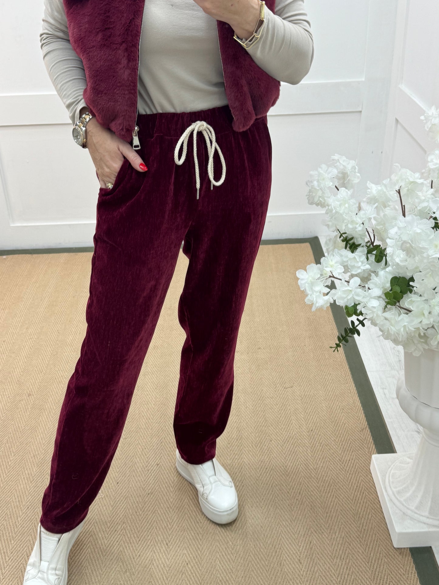 Velma: Burgundy velour trousers. One size: 12-18
