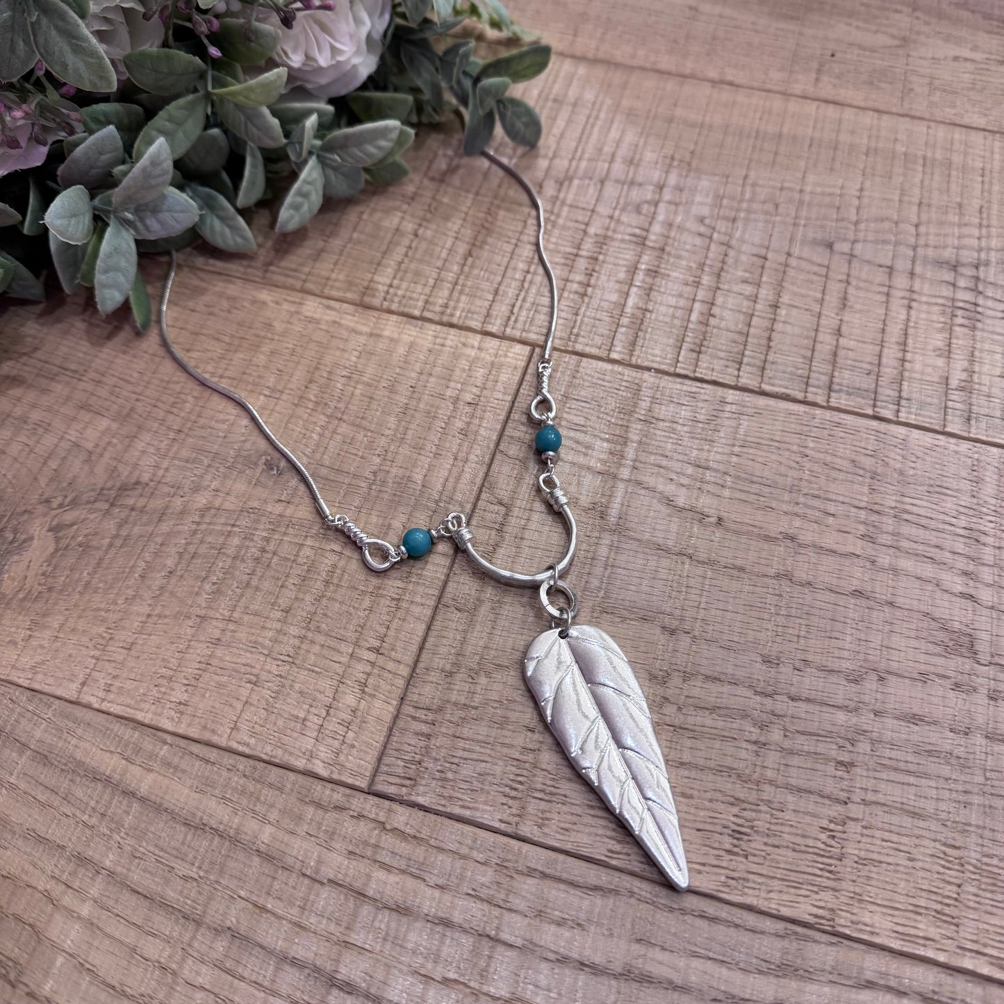 Marina: Long silver & blue leaf pendant necklace