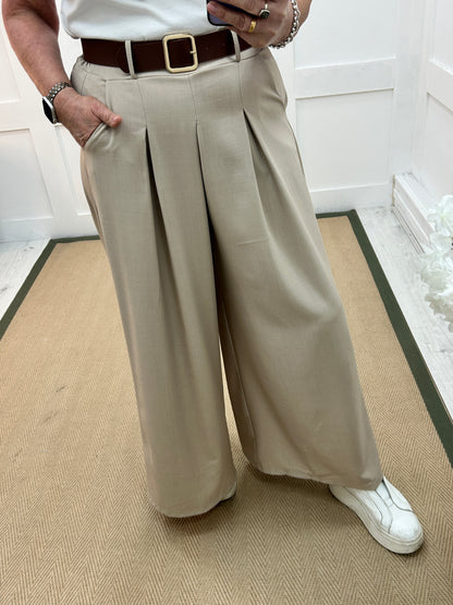 Zina: Beige pocket wide leg trousers. One size: 10-16