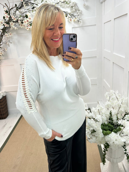 Arianne: White sparkle cutout shoulder top. One size: 12-16