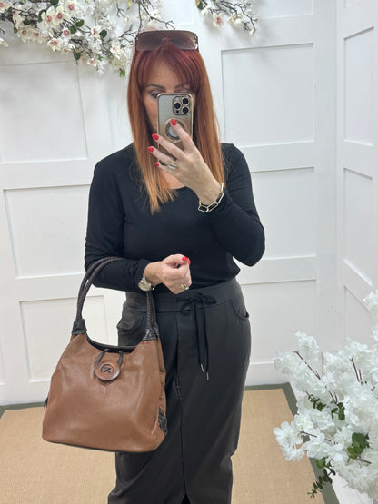 Pipa: Brown slouchy big button shoulder bag.