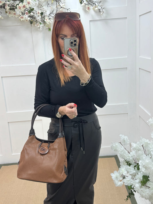 Pipa: Brown slouchy big button shoulder bag.