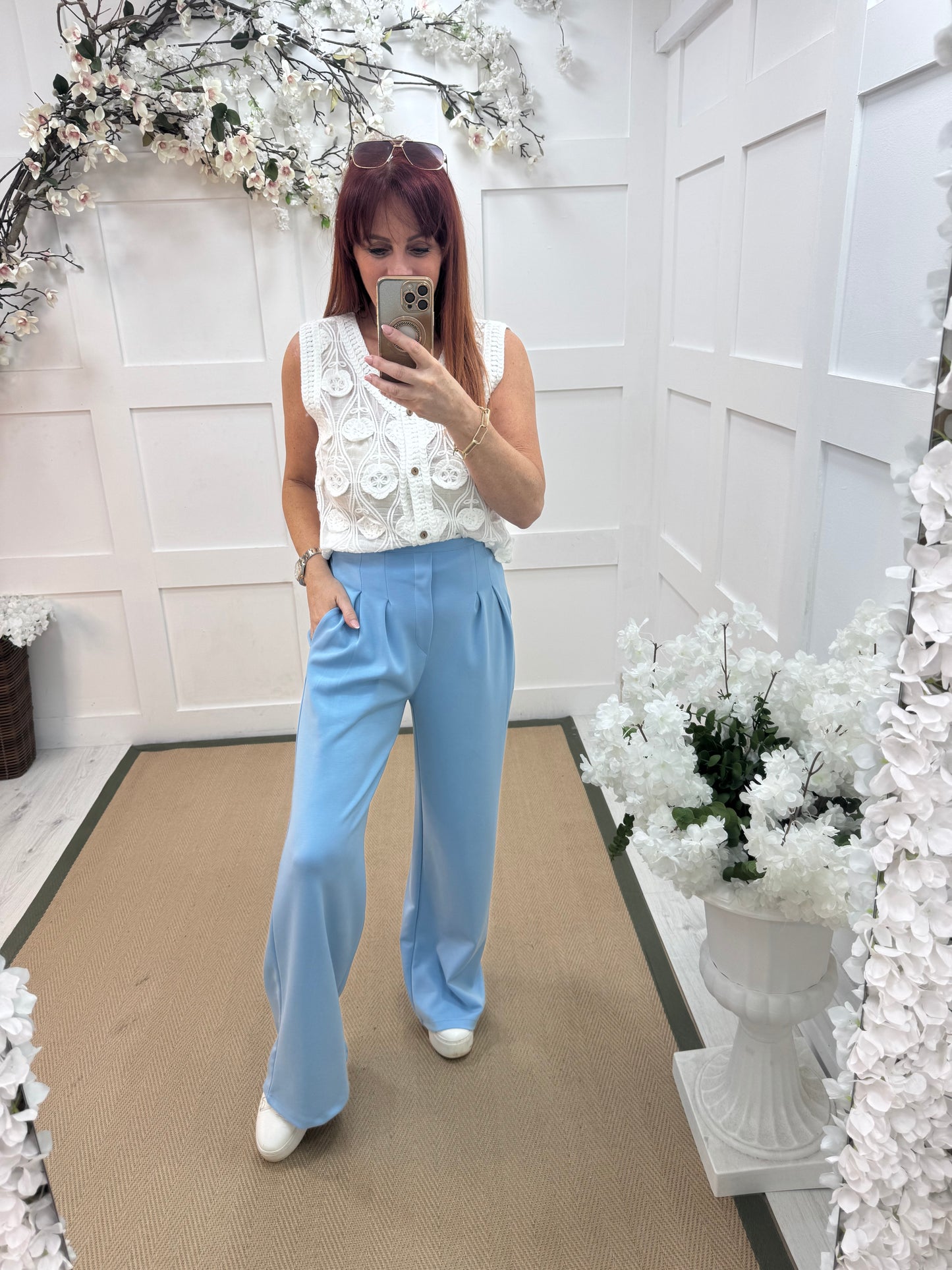 Tayla: Blue high waisted pleated wide leg trousers. One size: 10-16