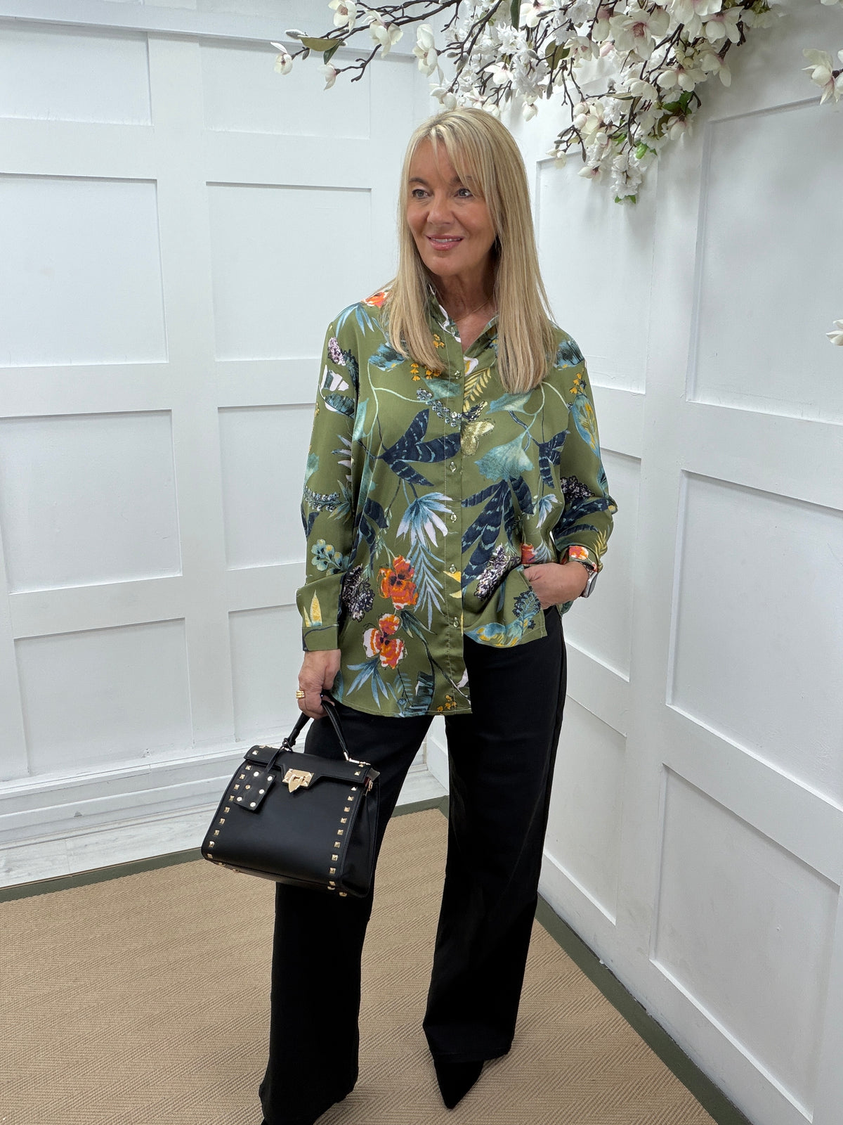 Kiki: Khaki floral print shirt. Sizes: 8-18