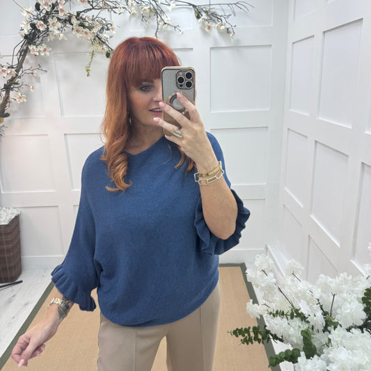 Sierra: Blue batwing fluted sleeve knitted top. One Size 12-18/20