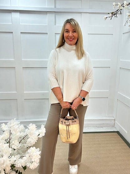 Sammie: Oatmeal high neck knitted top. One Sz: 12-18