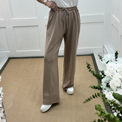 Trudy: Mocha stretchy wide leg pocket trousers. 2 sizes