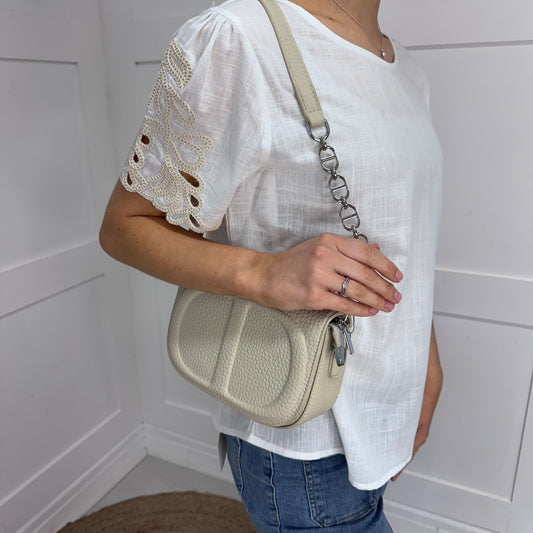 Shellie: Cream leather look cross body/clutch bag
