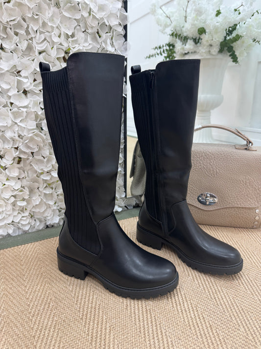 Trova Black stretchy knee high boots. Sizes: 3-8