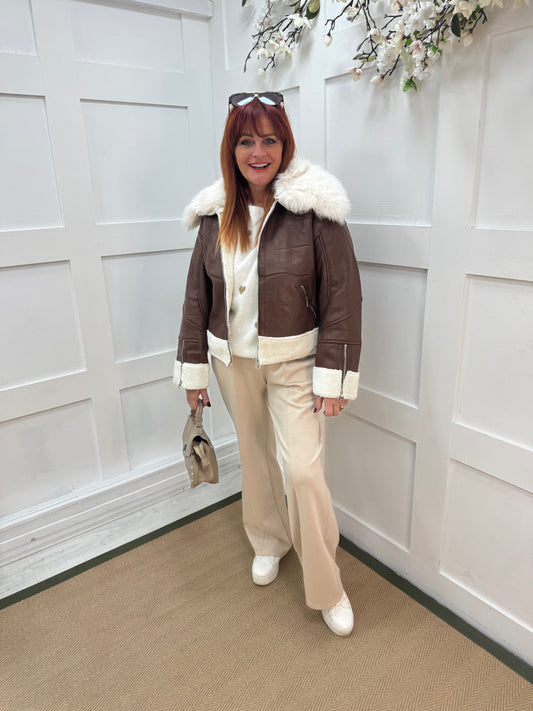 Fiora: Brown faux fur leather jacket. Two sizes