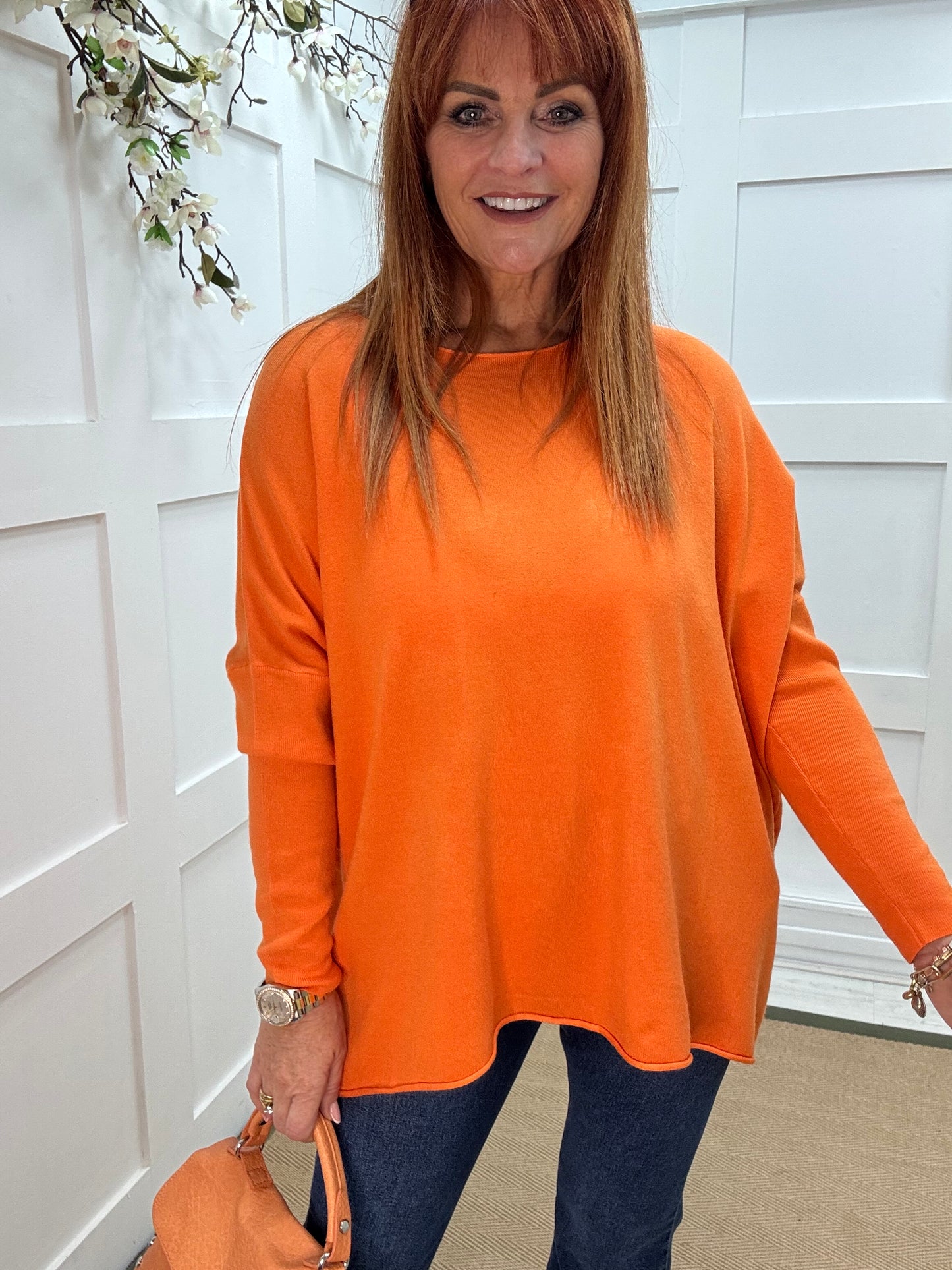 Maddie: Orange oversized long sleeve top. One size: 12-18
