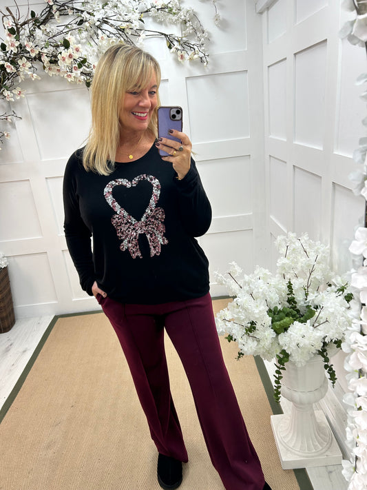 Harmony: Black sequin Christmas candy cane top. One size: 14-18