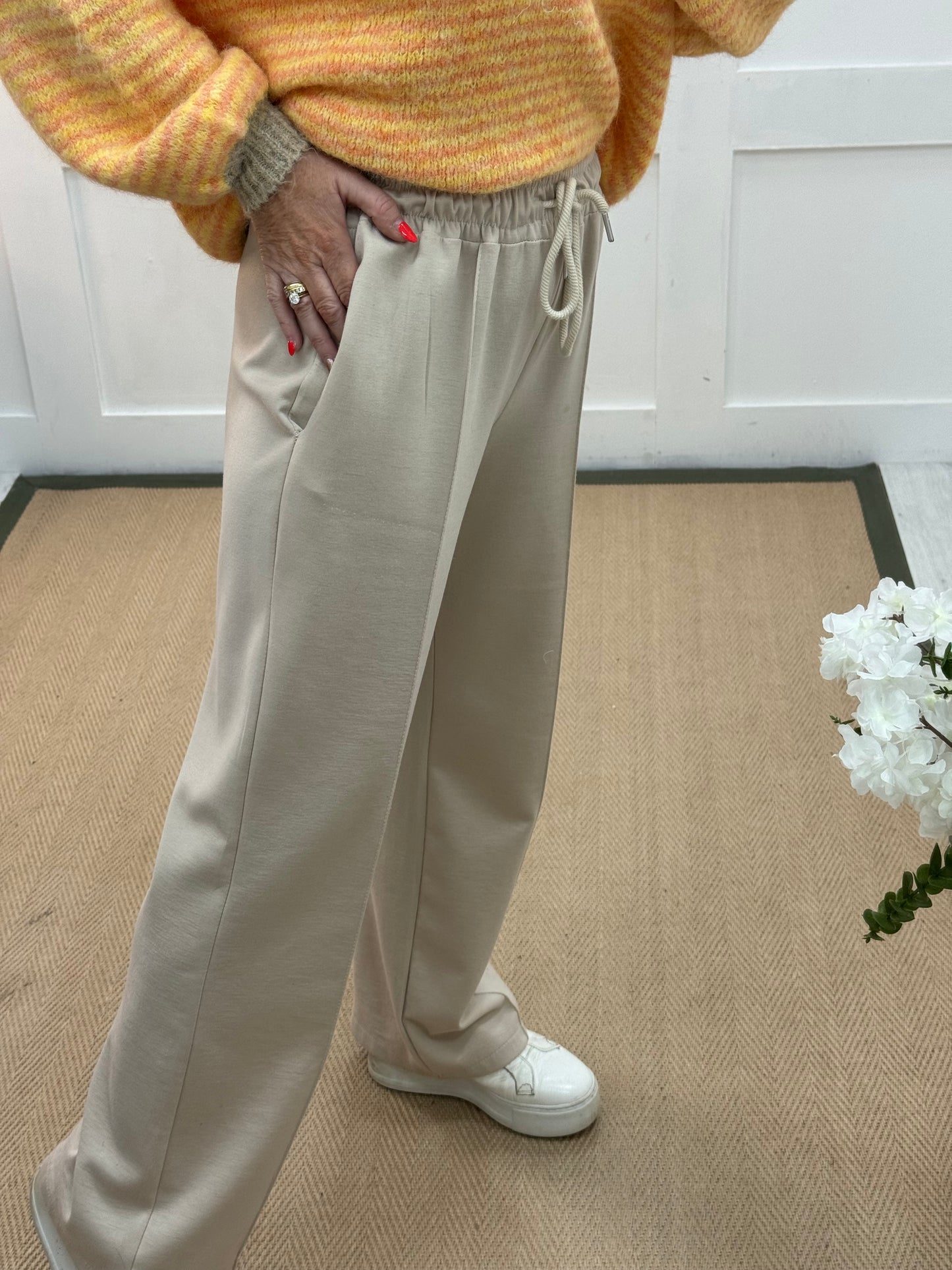 Trudy: Cream stretchy wide leg pocket trousers. 2 sizes