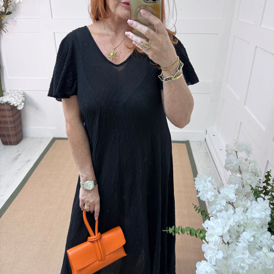 Megan: Black swing cotton maxi dress. One size: 10-18