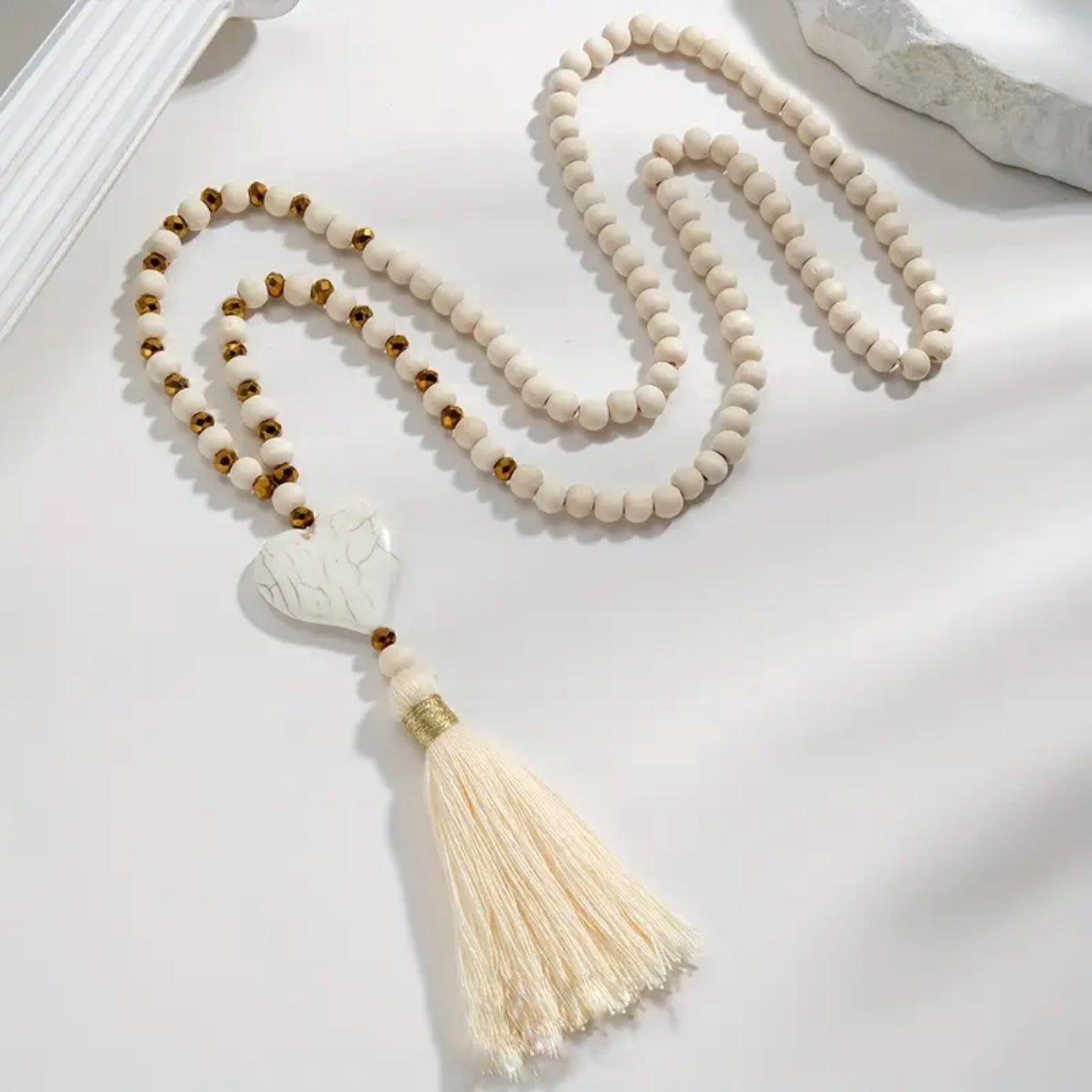 Jedda: Long white & gold bohemian heart necklace