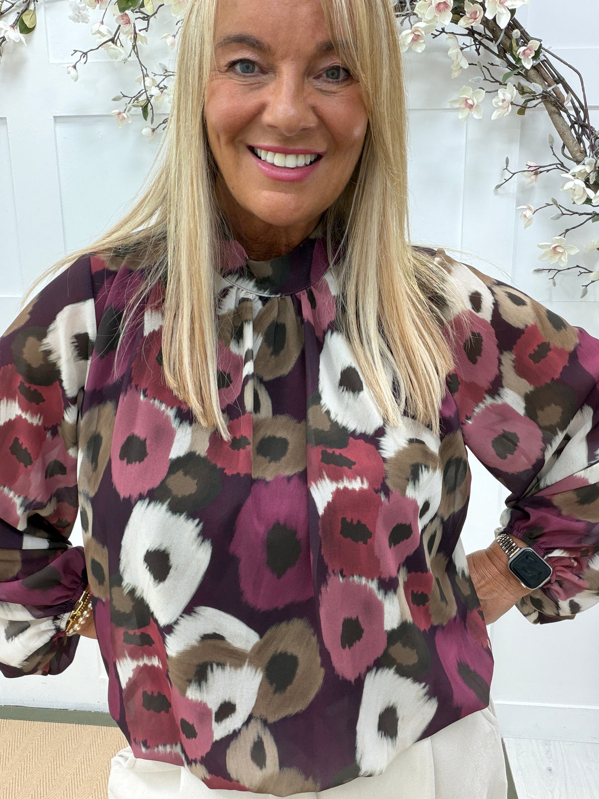 Perri: High neck printed blouse. One size: 12-18. 3 colours