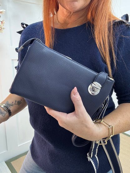 Britt: Navy three pocket crossbody bag.