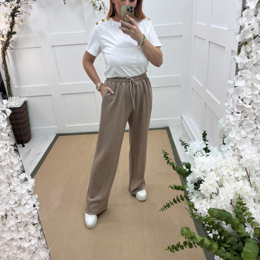 Trudy: Mocha stretchy wide leg pocket trousers. 2 sizes