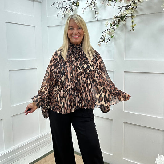 Leona: Oversized pleated leopard print blouse. One size: 14-20