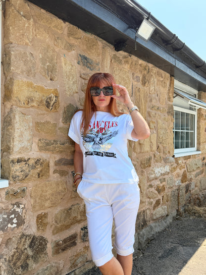 Liberty: White “Los Angeles” eagle graphic T shirt. One size: 10-16