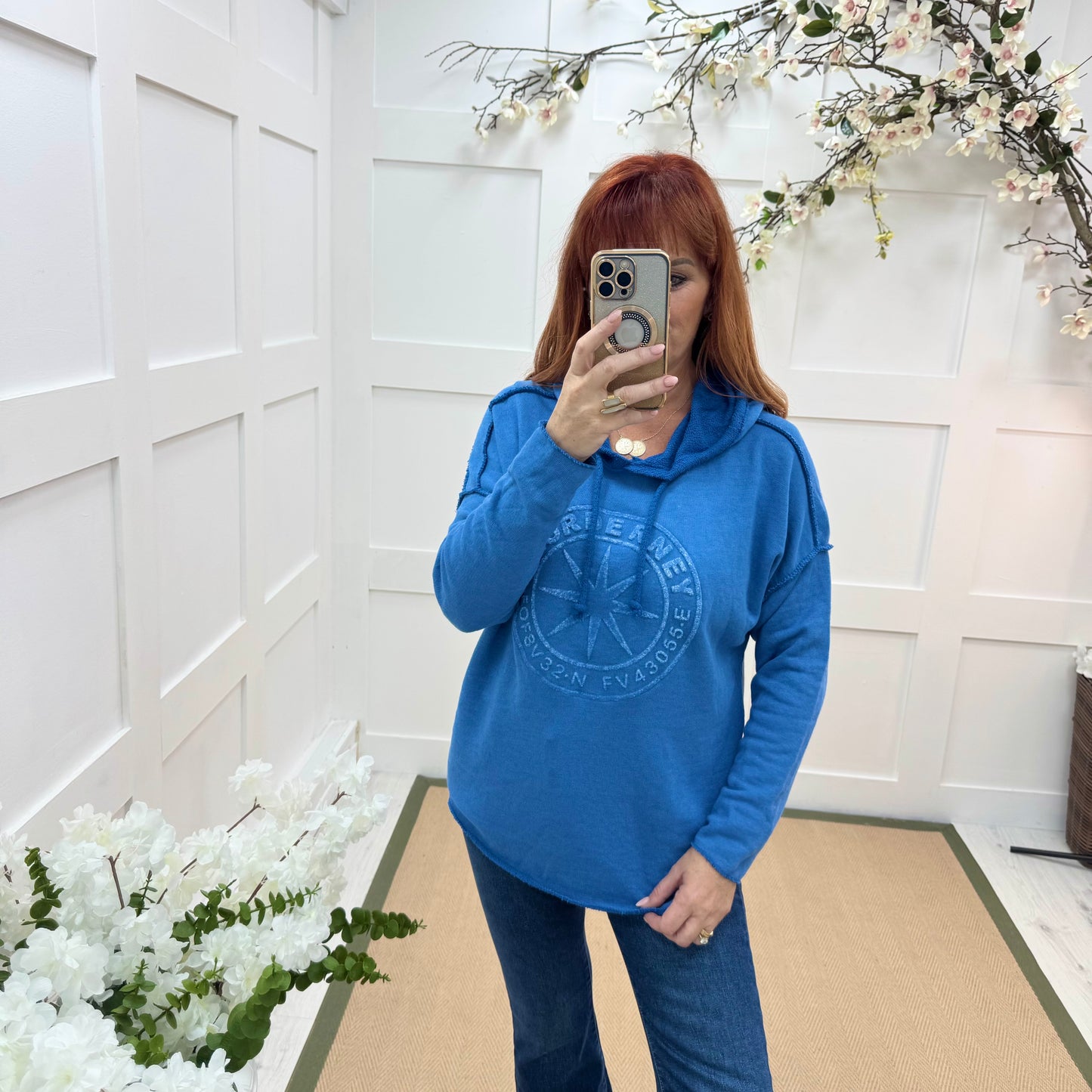 Sara: Cobalt hooded embossed compass top. One size: 12-18