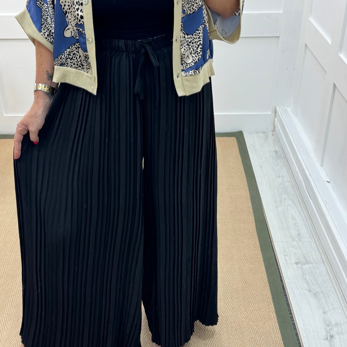 Payton: Black pleated wide leg trousers. One size: 12-22/24