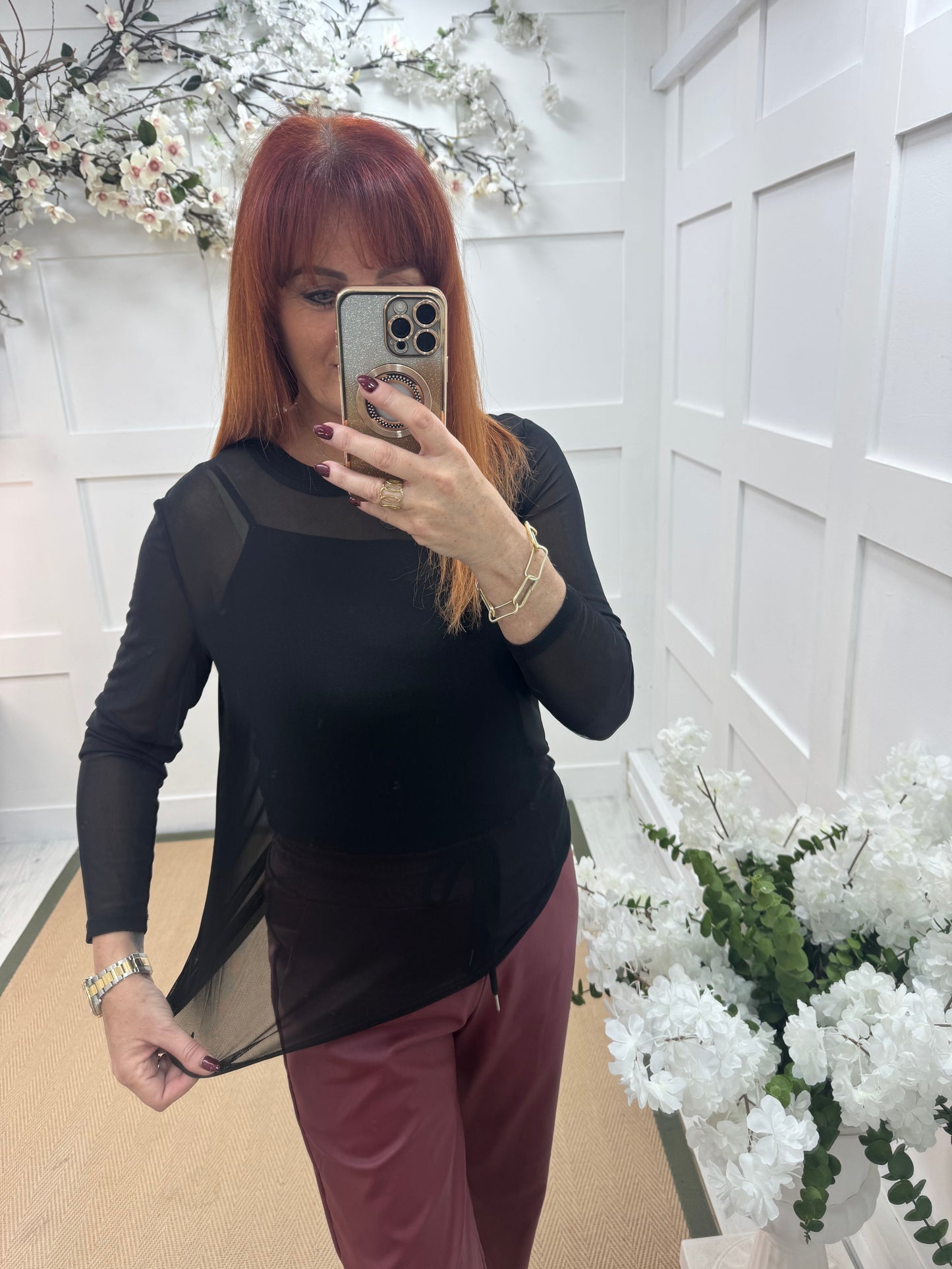 Romy: Black stretchy sheer mesh top. One size 12-18