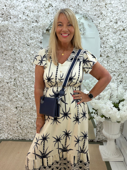 Penny: Navy & cream palm tree print short sleeve maxi dress. One size: 10-14