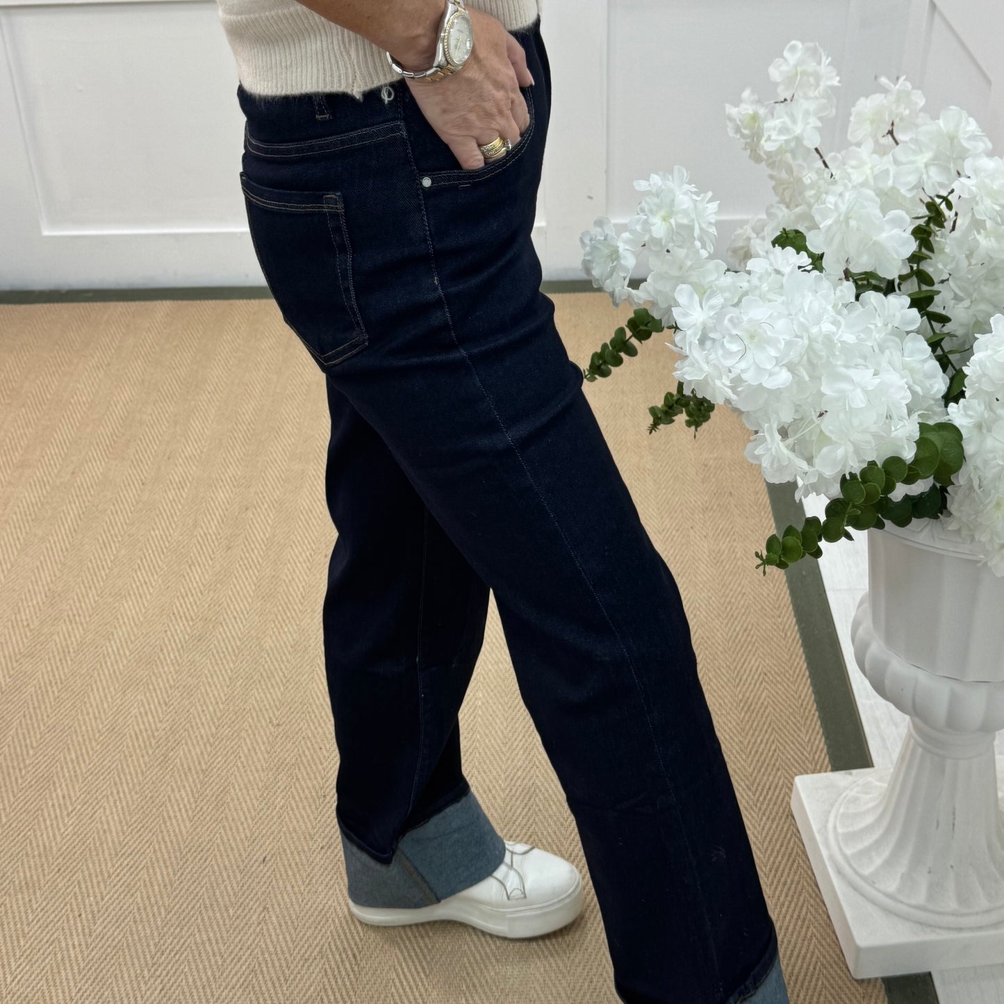 Nykki: Dark blue pocket turn up jeans. Sizes: 10-20