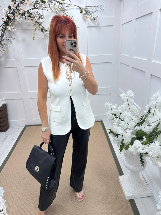 Avalon: White structured knit button waistcoat. One size: 10-16