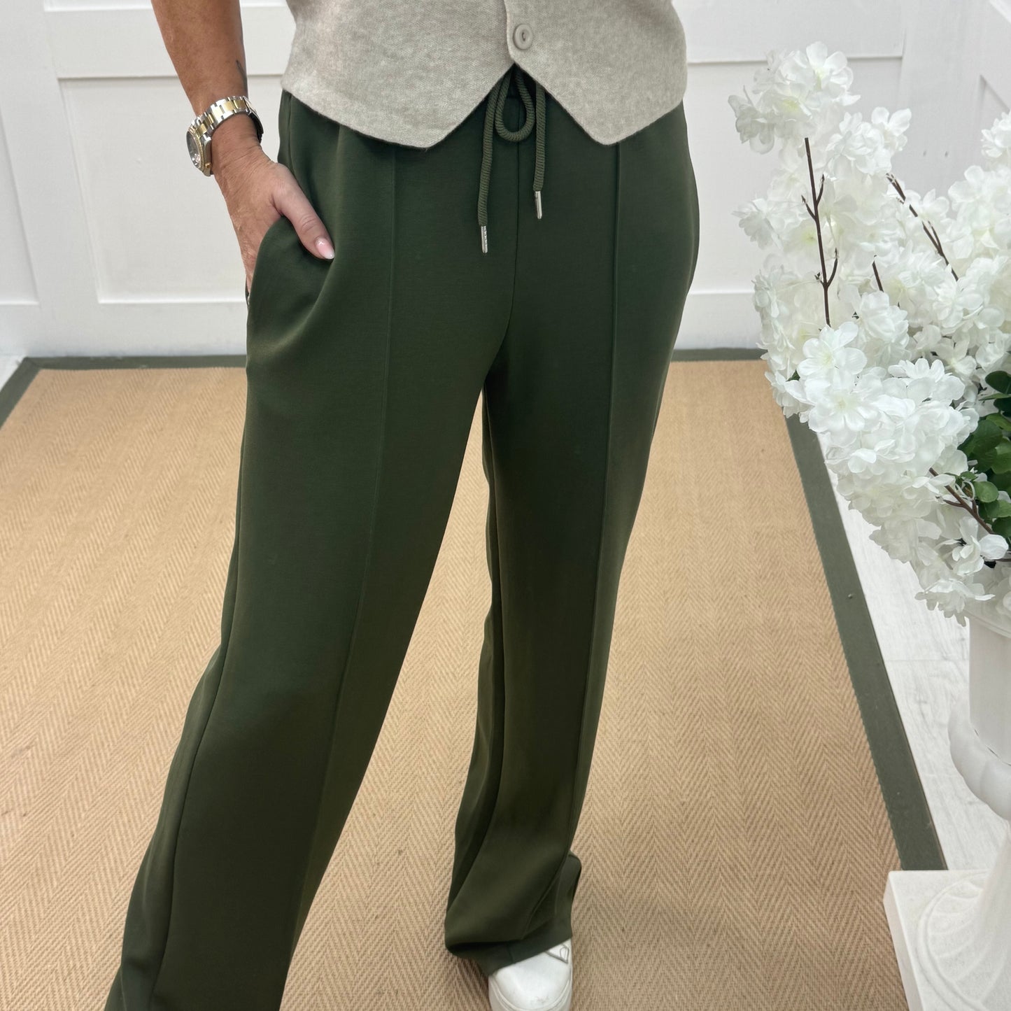 Trudy: Khaki stretchy wide leg pocket trousers. 2 sizes