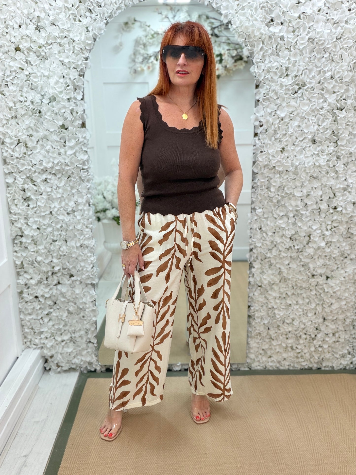 Tiffany: Cream & brown leaf print wide leg trousers. One size: 10-14
