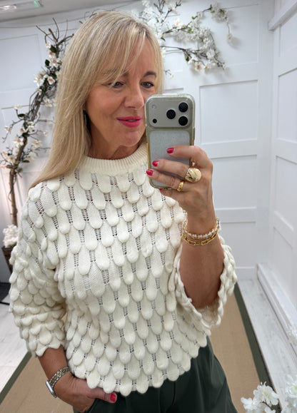 Tessy: Fluted sleeve teardrop top. One size: 12-16