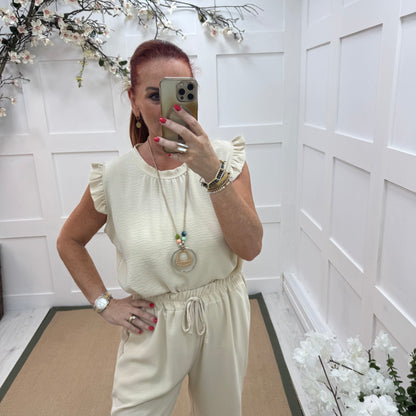 Esme: Cream pocket wide leg trousers. One size: 12-20