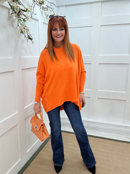 Maddie: Orange oversized long sleeve top. One size: 12-18