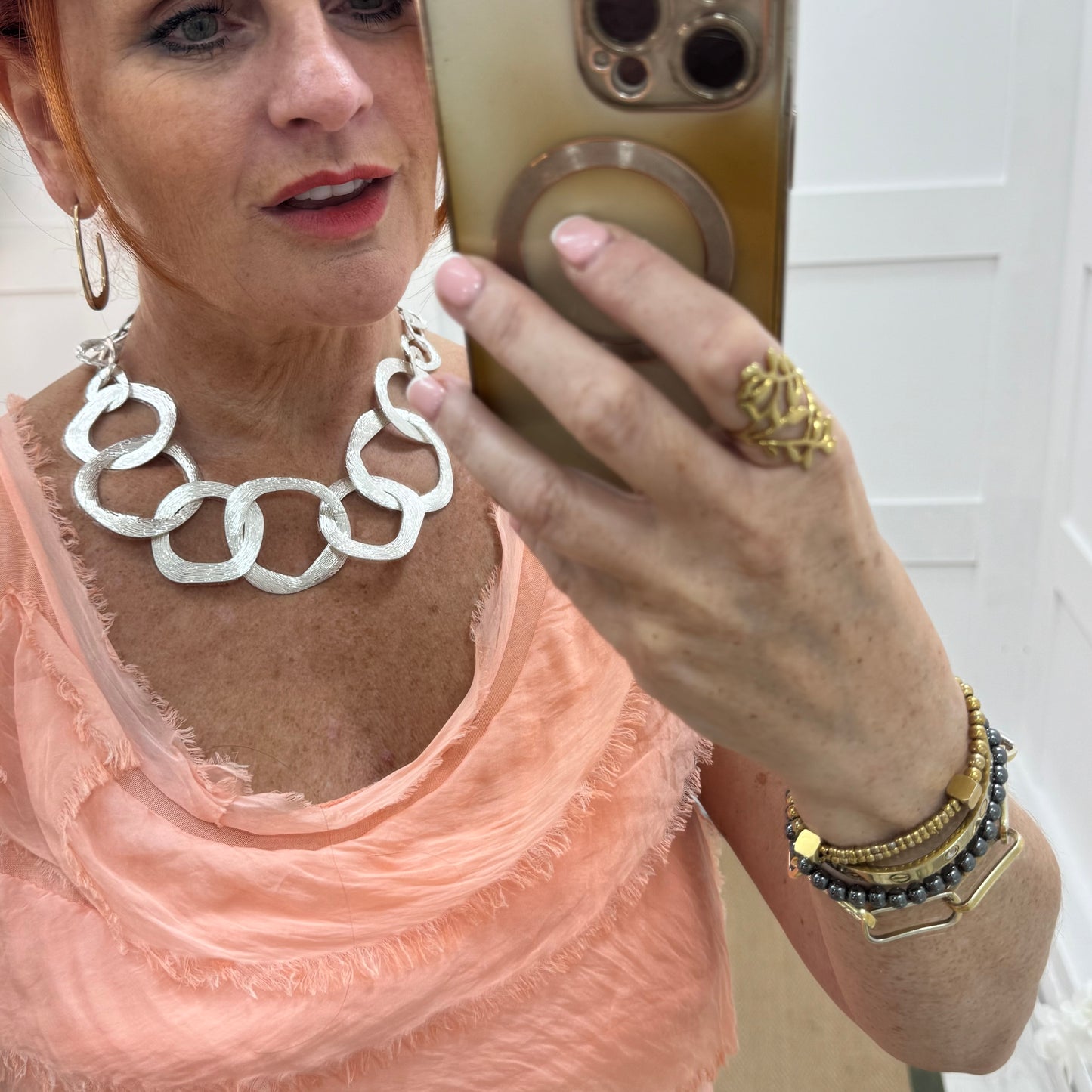 Shona: Silver metal rings statement necklace