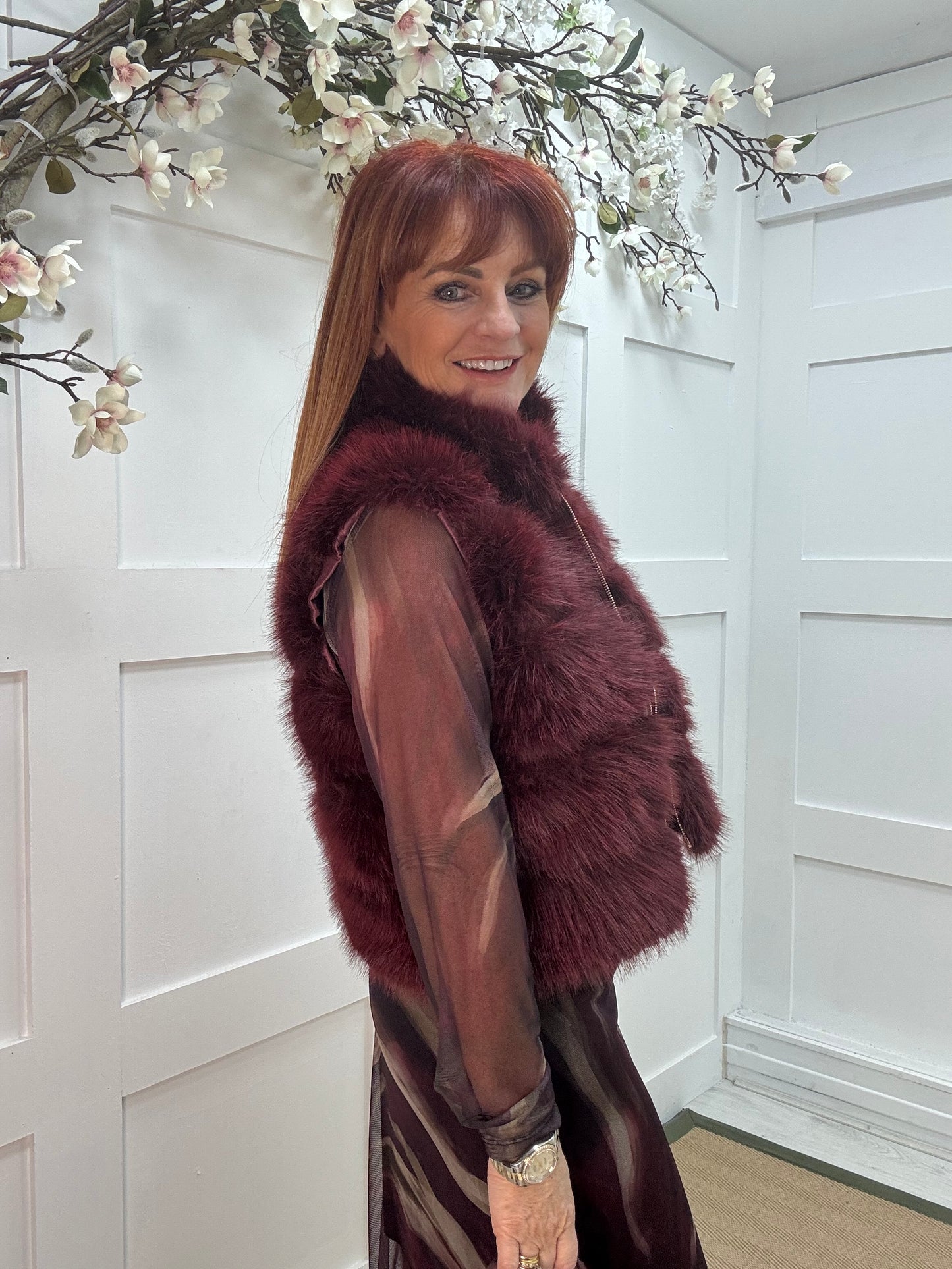 Kizzy: Burgundy zip up faux fur gilet. One size 8-16