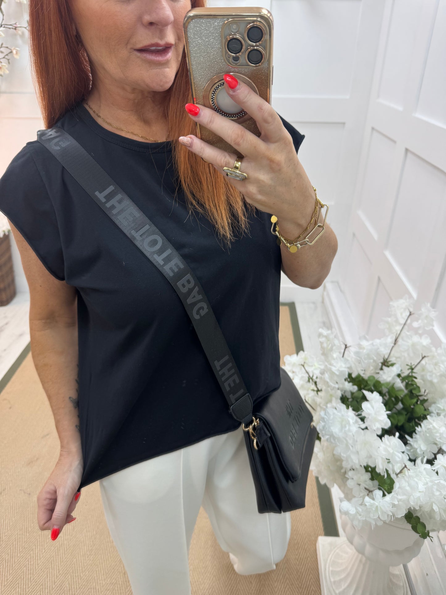 Neve: Basic black cotton T shirt. One size: 10-18