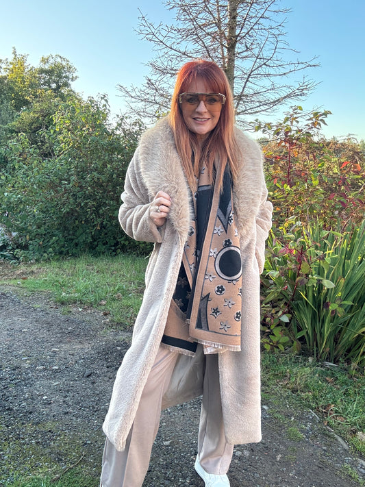 Madeleine: Beige long faux fur coat . One size 12-18