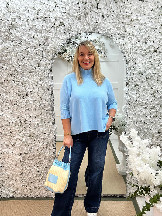 Sammie: Blue high neck knitted top. One Sz: 12-18