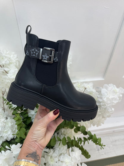 Larrie: Black designer inspired chelsea boots. Sizes 3-8.
