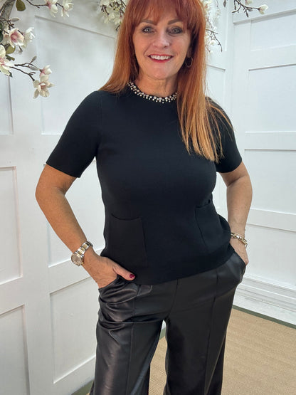 Rosheen: Black rhinestone pocket top. One size: 8-14