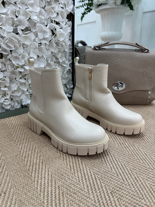 India: Cream chunky chelsea boots. Sizes 3-8